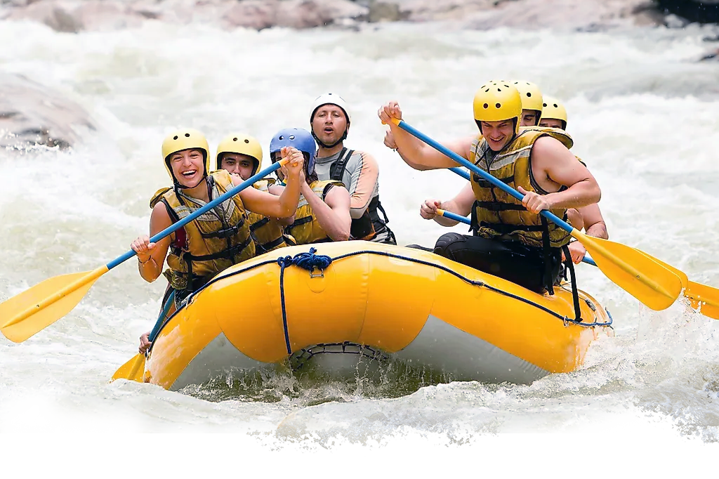 People enjoying white water rafting experience